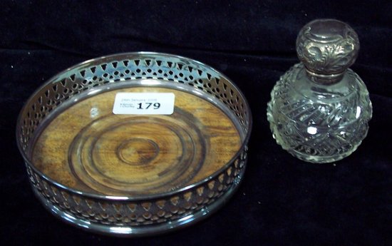 Appraisal: A coaster with pierced gallery and turned wood base cm