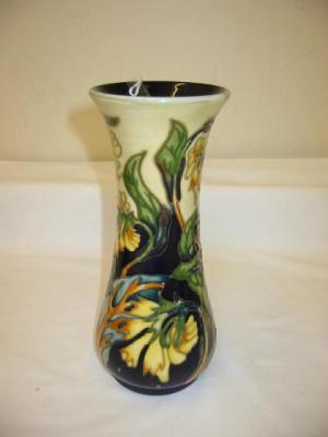 Appraisal: A WALTER MOORCROFT POTTERY VASE of squat baluster form painted