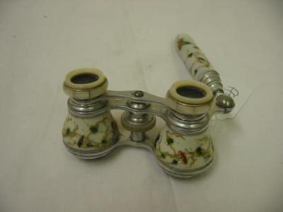 Appraisal: A PAIR OF PORCELAIN OPERA GLASSES the white metal mounts