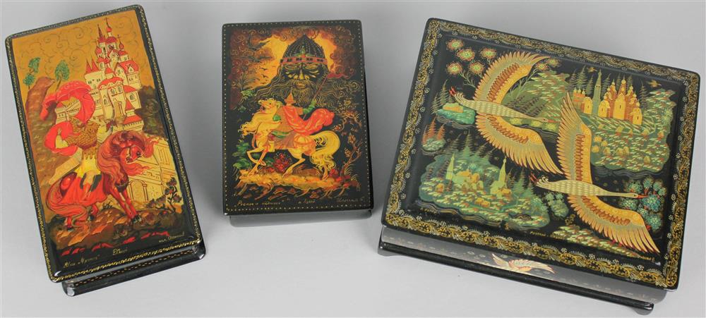 Appraisal: THREE KHOLUI RUSSIAN LACQUER BOXES all the boxes are papier-mache