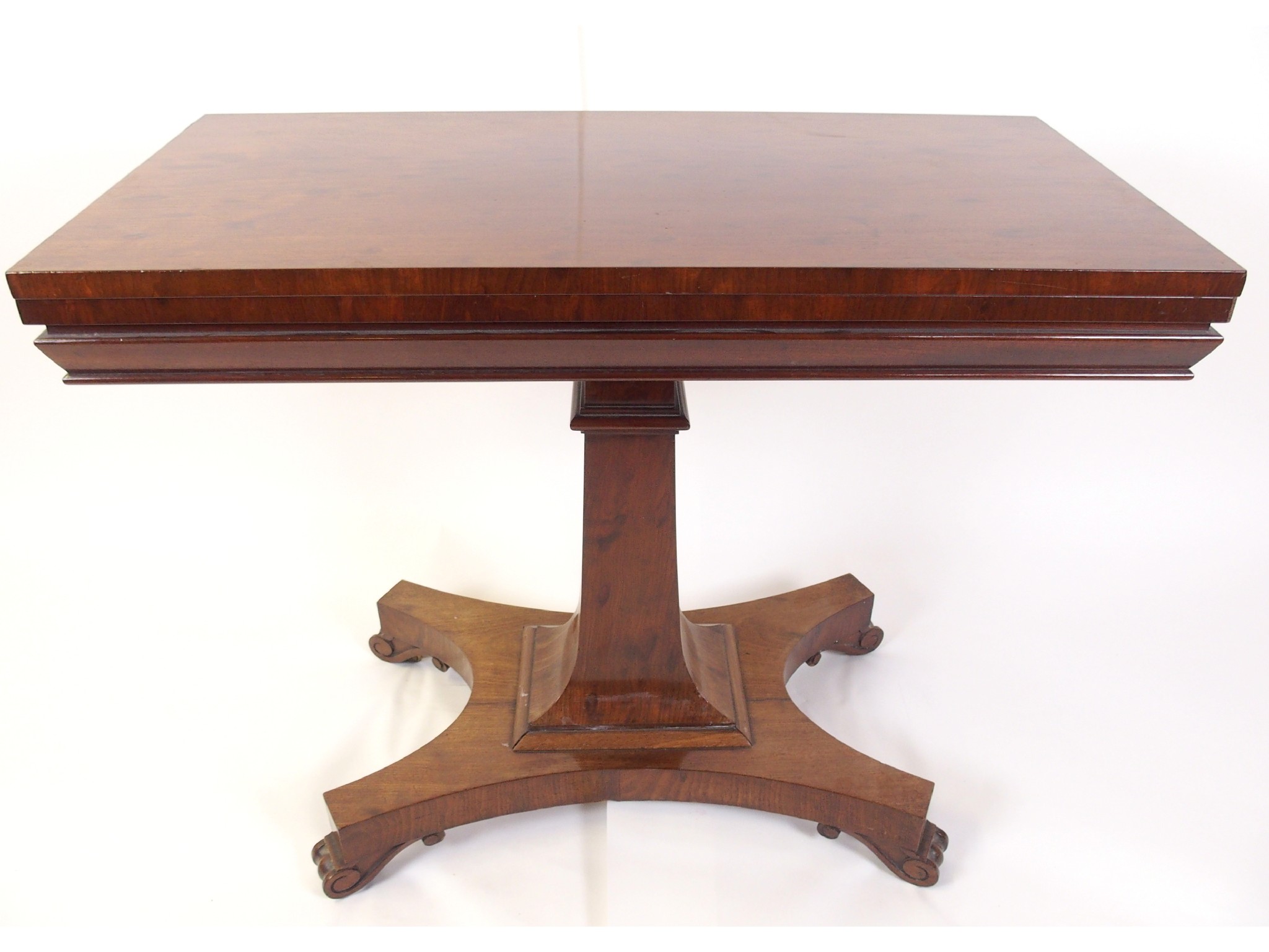 Appraisal: A Victorian mahogany fold-over tea tablethe hinged top on square