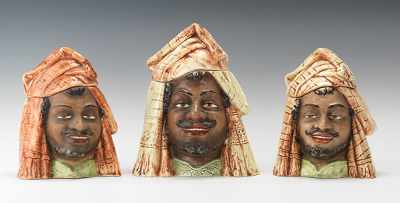 Appraisal: Three Similar Tobacco Jars of Arab Figural Heads Porcelain jars