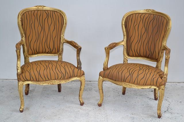 Appraisal: A PAIR OF LOUIS XV STYLE ARMCHAIRS WITH CONTEMPORARY UPHOLSTERY