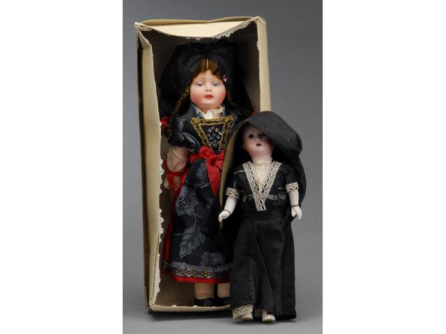 Appraisal: Lot Two Ethnic Dolls Includes fine quality celluloid shoulder head