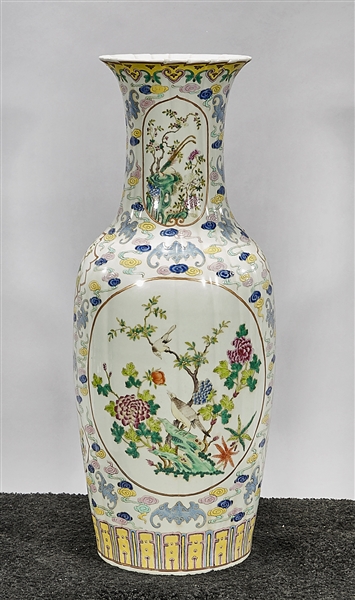 Appraisal: Tall Chinese enameled porcelain vase central scenes of figures birds