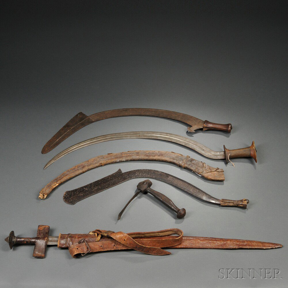 Appraisal: Five African Weapons a small adze two North African swords