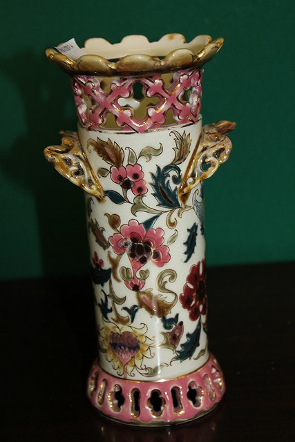 Appraisal: A ZSOLNAY CYLINDRICAL IVORY GROUND VASE with pierced decoration cm