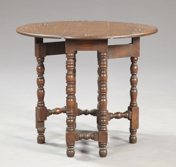 Appraisal: Diminutive English Oak Drop-Leaf Table early th century the rounded