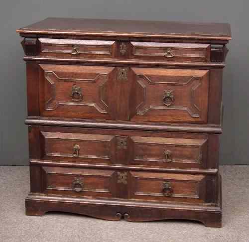 Appraisal: A late th early th Century panelled oak chest of