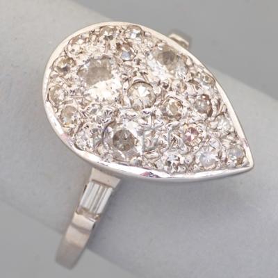 Appraisal: K WHITE GOLD DIAMOND DINNER RING ca Pear-shaped diamond pave