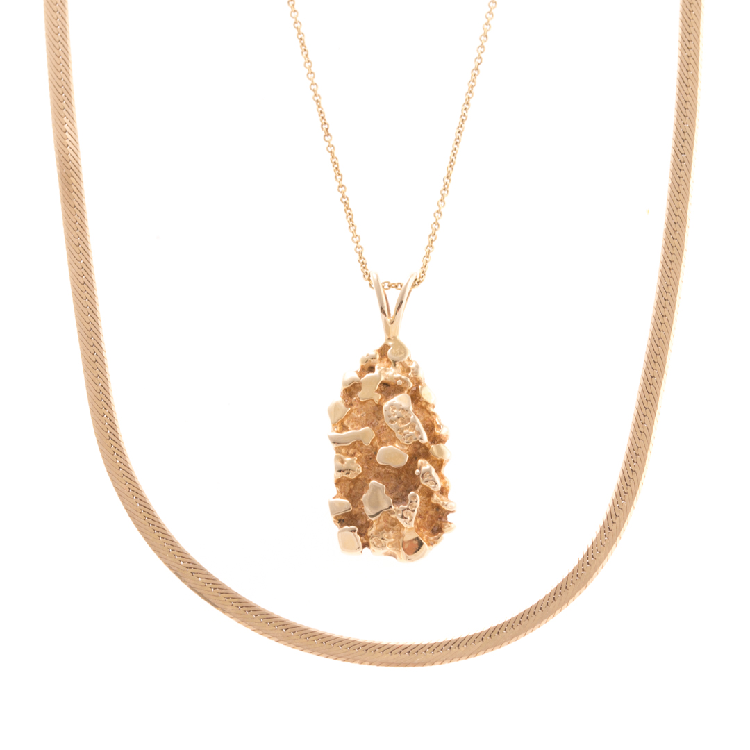 Appraisal: An Italian Chain and Gold Nugget Pendant in K K