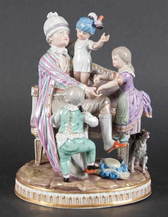 Appraisal: Meissen porcelain figural group late th century modeled as father