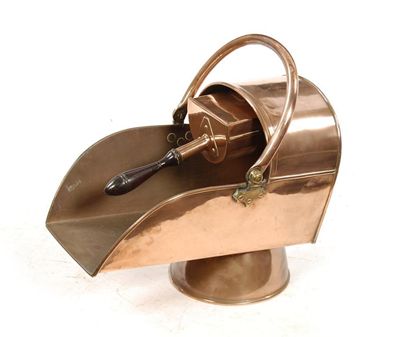 Appraisal: A late Victorian copper coal scuttle and shovel in cm