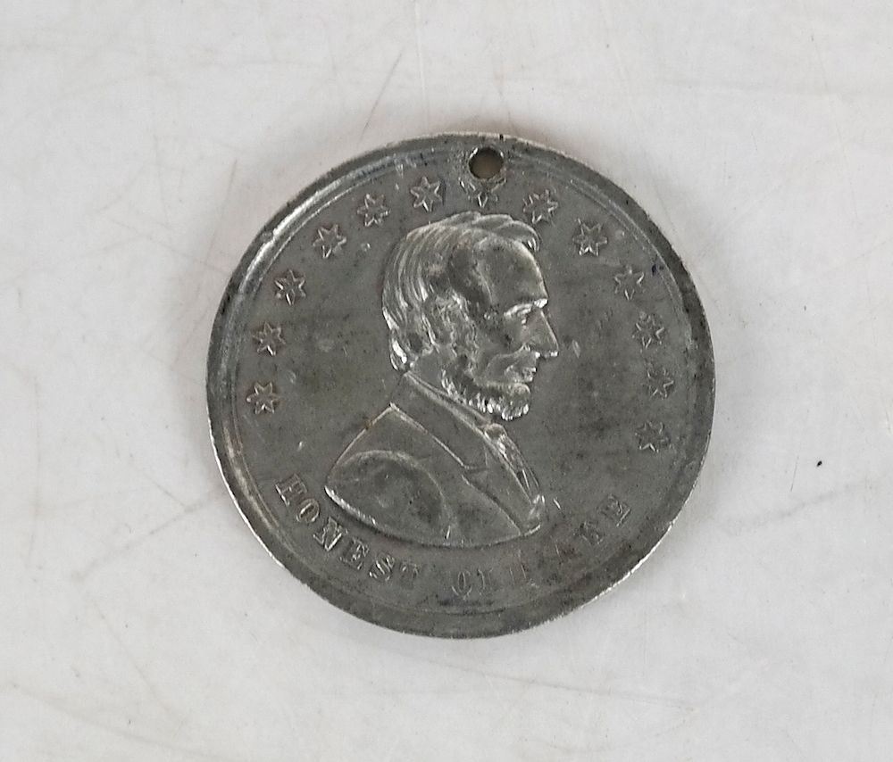 Appraisal: Abraham Lincoln Medalet Abraham Lincoln medalet White metal mm DeWitt