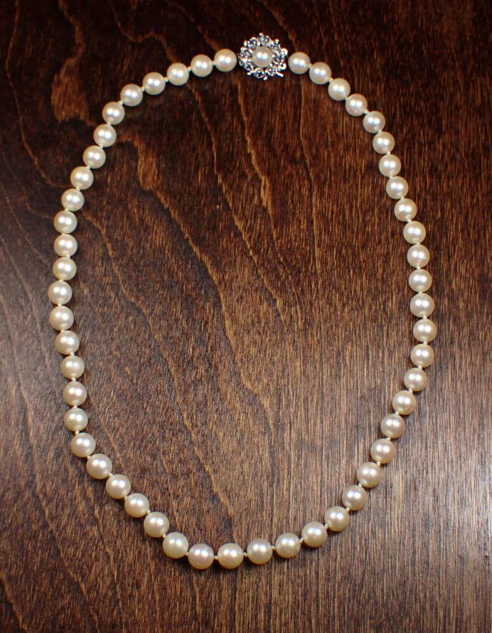 Appraisal: PRINCESS LENGTH PEARL NECKLACE WITH SAPPHIRE CLASP hand-knotted strand of