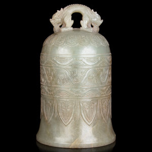 Appraisal: A Chinese Carved Celadon Jade Bell with double dragon-form looped