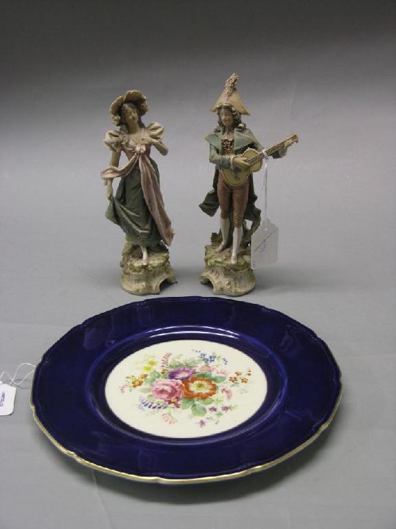 Appraisal: A pair of Austrian figures porcelain figures gallant playing guitar