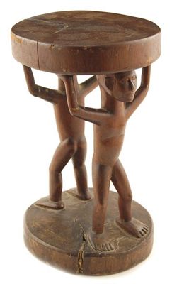 Appraisal: A Ingorat Phillipine carved wood group of two figures supporting