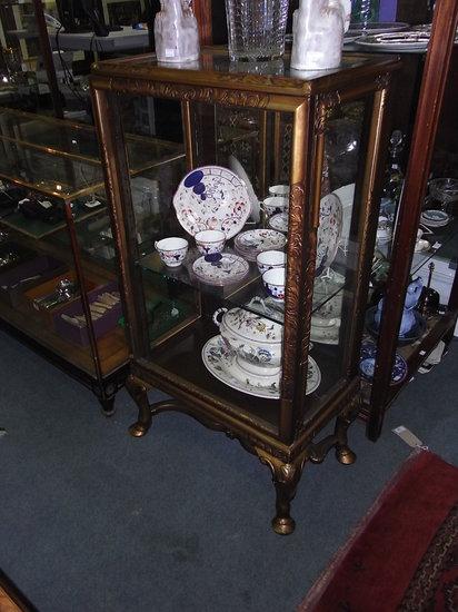 Appraisal: A GILTWOOD VITRINE by Whytock Reid of Edinburgh with leaf