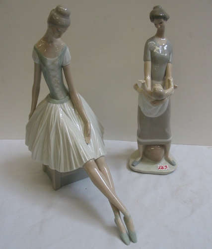 Appraisal: TWO GLAZED PAINTED PORCELAIN SPANISH FIGURES One is a Lladro