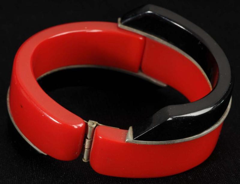 Appraisal: Bakelite Black Red Deco Clamp Bracelet Description Very rare Hinged