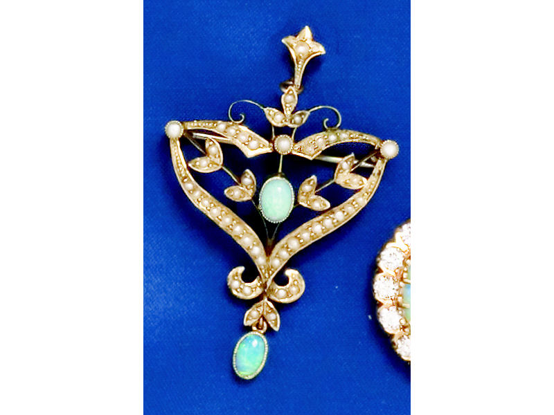 Appraisal: OPAL AND PEARL LAVALIER k yellow gold centering one oval