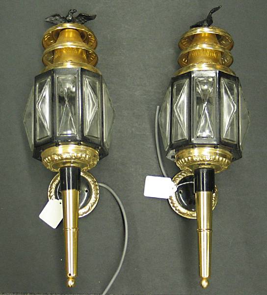 Appraisal: A pair of Neoclassical style brass and glass carriage lanterns