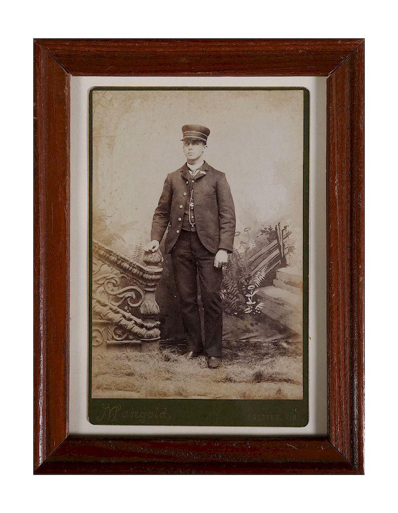 Appraisal: PALATKA Cabinet Card Train Conductor Cabinet card photograph of a