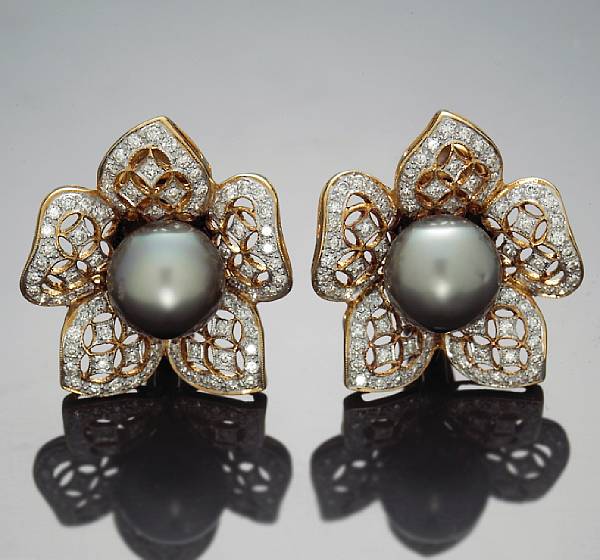 Appraisal: A pair of South Sea cultured pearl and diamond earrings