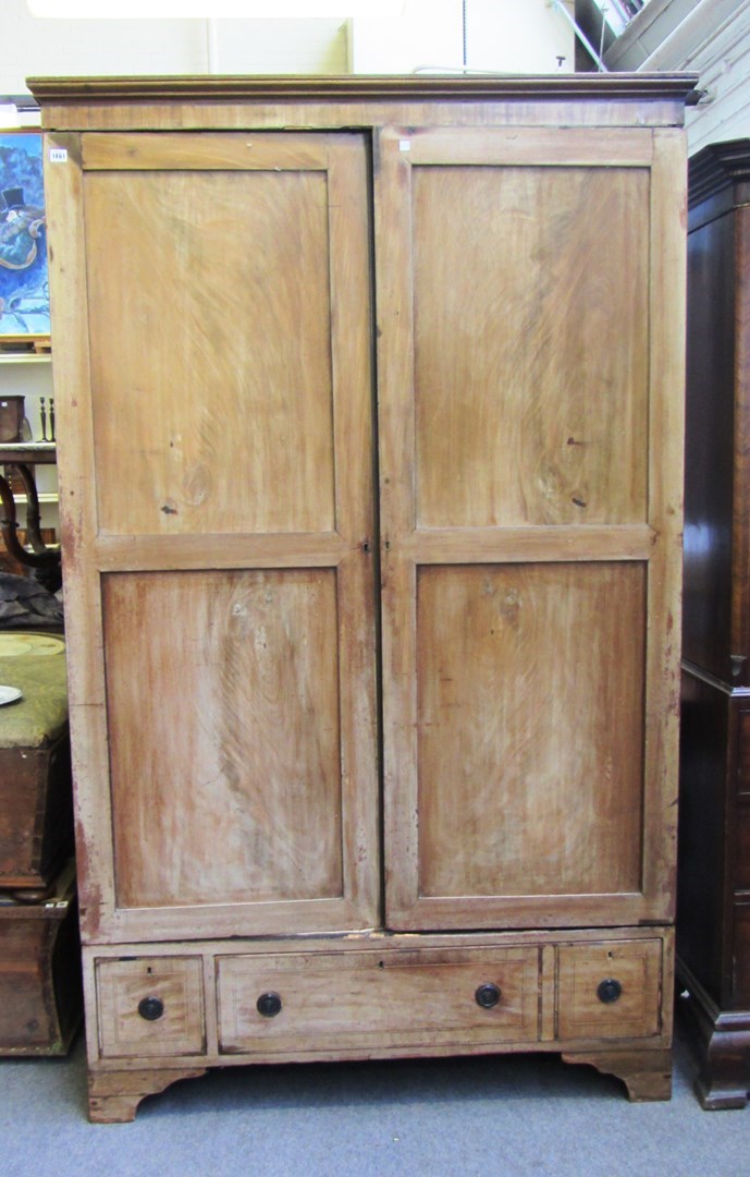 Appraisal: A th century mahogany hanging cupboard the stepped cornice over