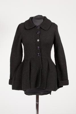 Appraisal: Redheart England a black knitted wool peplum jacket with revere