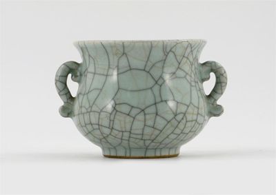 Appraisal: A Chinese two-handled bowl decorated with a crackled pale celadon