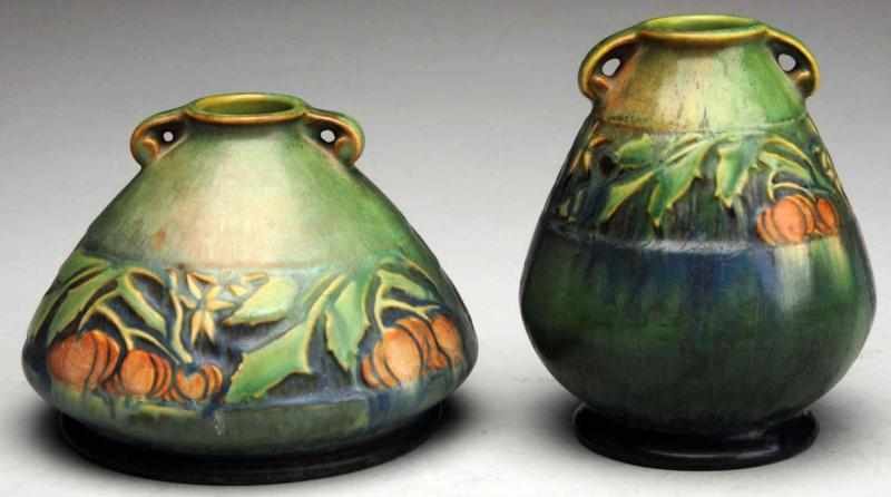 Appraisal: Pair of Green Baneda Vases Smaller vase has restoration to