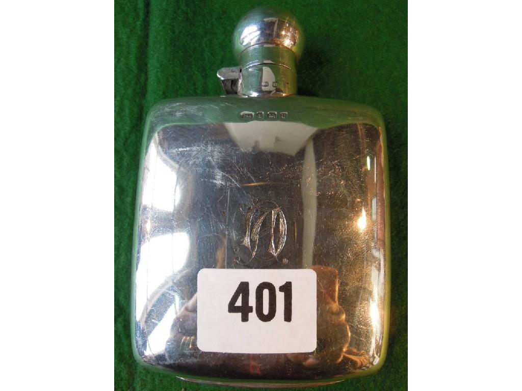 Appraisal: A silver hip flask with flip over stopper bearing the