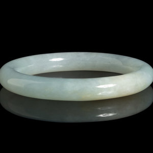 Appraisal: A Transparent Pale Celadon Jadeite Bangle the smooth translucent stone