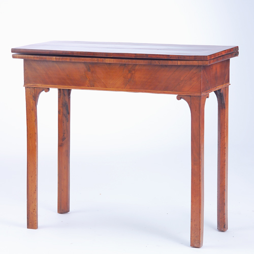 Appraisal: George III English flip-top game table with bookmatched walnut veneer