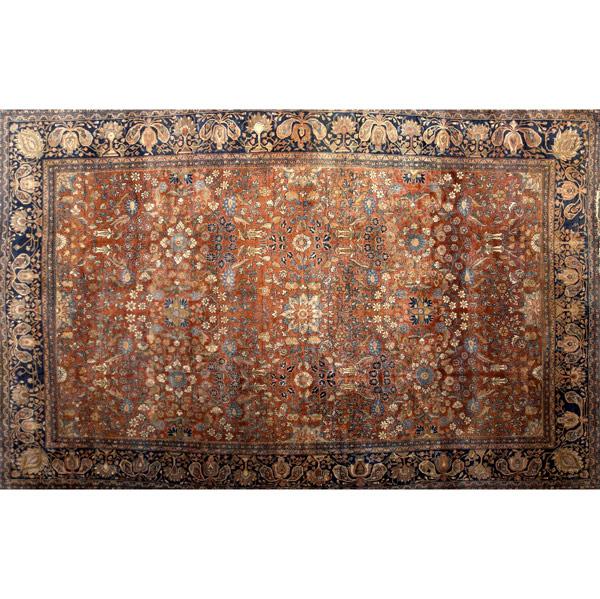 Appraisal: SAROUK Oriental carpet with red ground and blue border ca