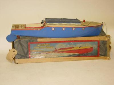 Appraisal: A HORNBY SPEED BOAT Viking clockwork powered with sliding hatch