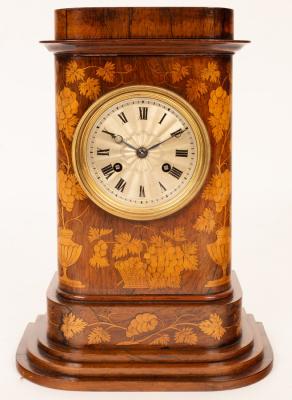 Appraisal: A French cased mantel clock the marquetry inlaid case with