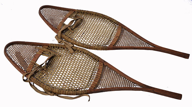 Appraisal: A PAIR OF OLD WOODEN AND WOVEN HIDE SNOW SHOES