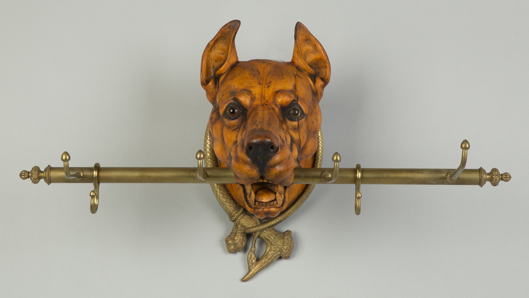 Appraisal: Carved Maple Great Dane Hat Rack th century With brass