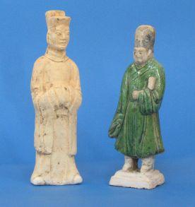 Appraisal: A TANG STYLE EARTHENWARE TOMB FIGURE of a dignitary wearing