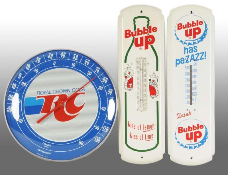 Appraisal: Lot of Advertising Thermometers Description Includes two tin Bubble Up