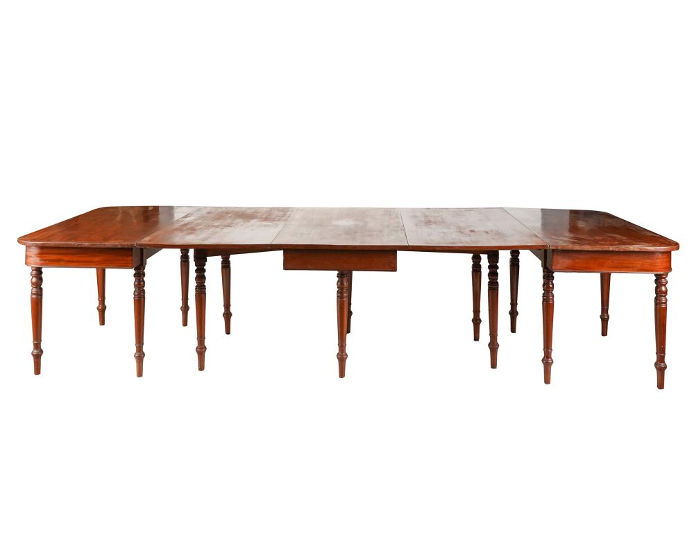 Appraisal: MAHOGANY BANQUET DINING TABLEin three parts with clips the center