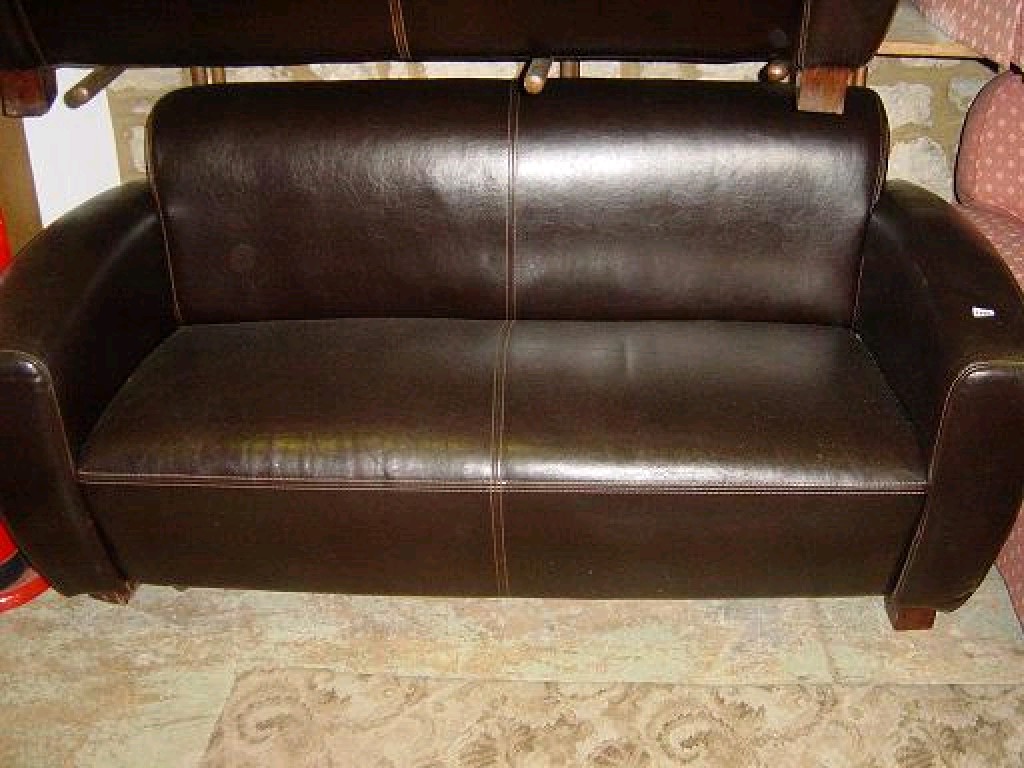 Appraisal: A good quality Art Deco style dark brown leather upholstered