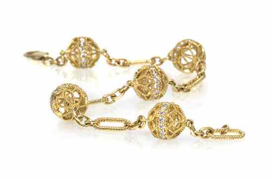 Appraisal: A Karat Yellow Gold and Diamond Bracelet containing numerous round