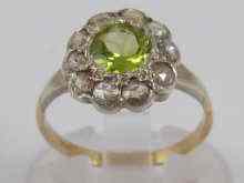 Appraisal: A yellow metal tests carat gold peridot and diamond cluster