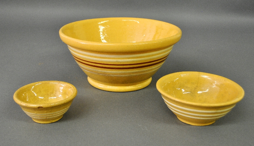 Appraisal: - Three th c yellow ware bowls largest h x