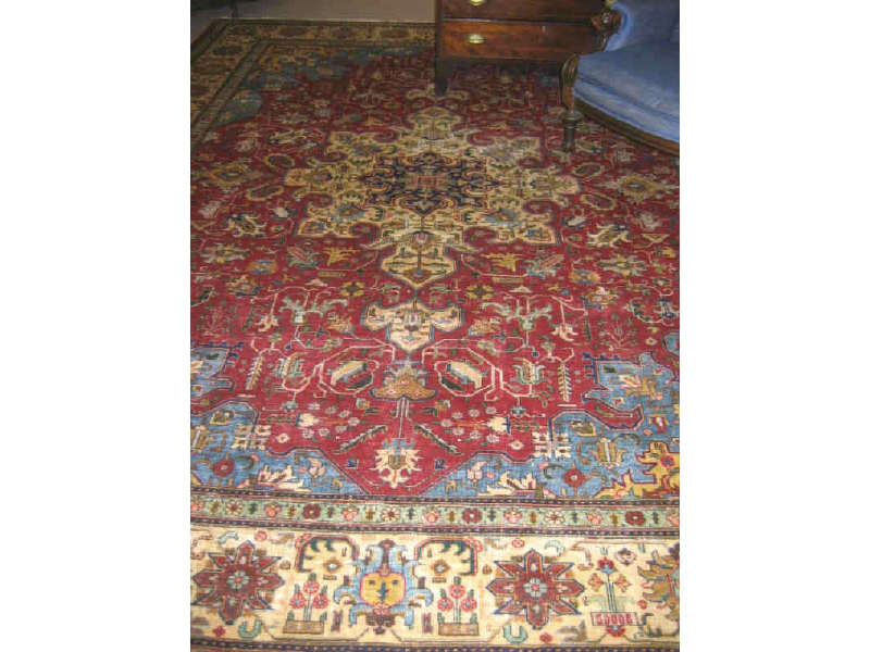 Appraisal: TABRIZ ROOM RUG Woven in the Heriz style the red