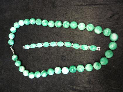 Appraisal: Jade bead necklace and bracelet mm carved jade beads with